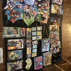 Lot Of Pokémon Cards And Comics