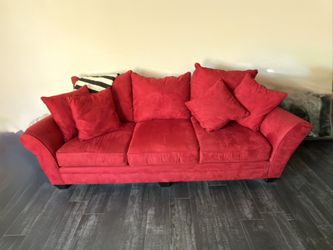 Red Sofa with Pillows