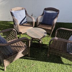 4 Outdoor Chairs And 2 Small Tables