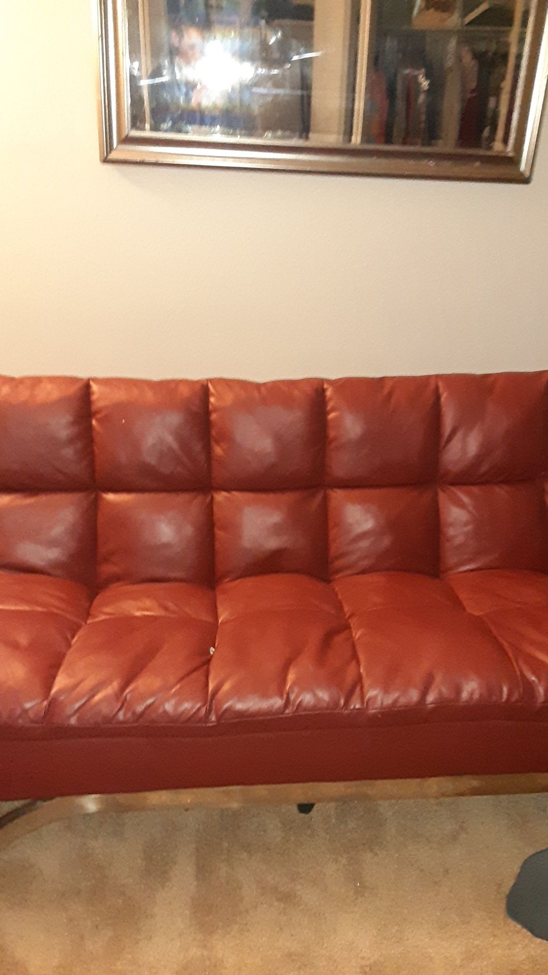 Red leather futon