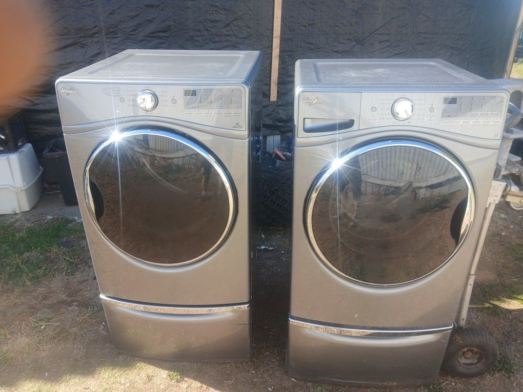 smart washer and dryer set with storage ben on bottom