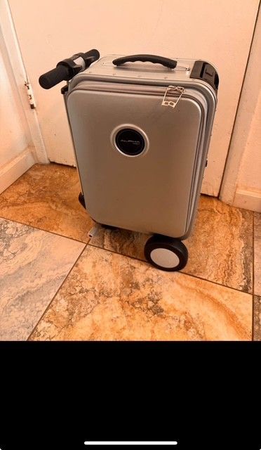 Alpha Robot Smart Rideable Suitcase TSA Approved.