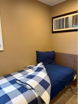 2 twin size beds with mattresses
