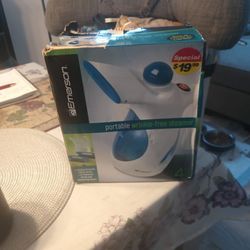 Brand New In Opened Box portable steamer 