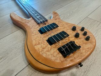 2005 Yamaha TRB1004 Bass Guitar Curly Quilted top.