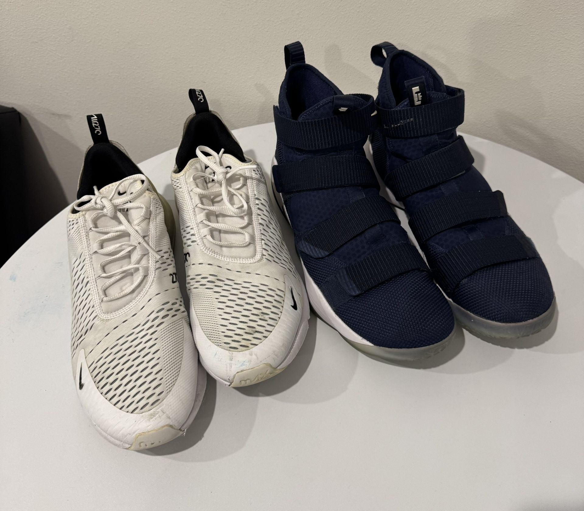 Two pairs of Nike shoes – Size US 14. Bundle deal – both for $75