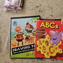 Two Books. Writing ABC and White Drawing Paper