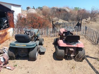 Sit down lawn mowers