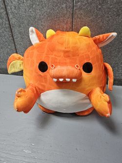 ZURU Snackles Felix the Dragon plush toy.