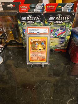 Pokémon Charizard Base Set 2 (PSA 4)