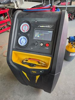Evac and recharge with professional Automotive AC Machine