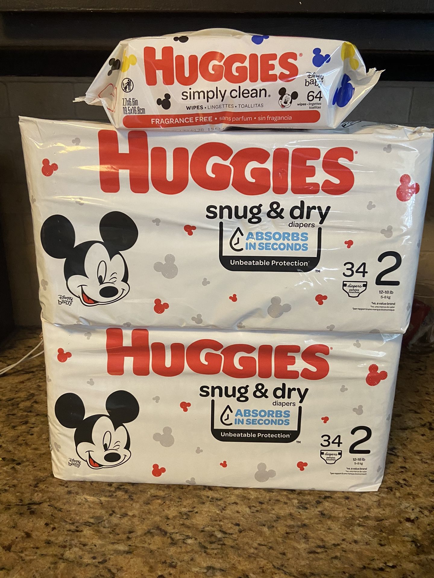 Set of 2 huggies SIZE 2 diapers•34ct• w 1 pack wipes 64ct•all for $20