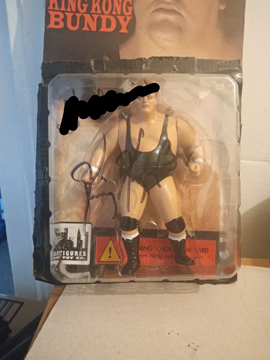 Autographed King Kong Bundy action figure 