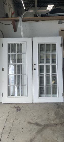 2 exterior metal double doors with exterior grids sold separately 35x35x77 good condition