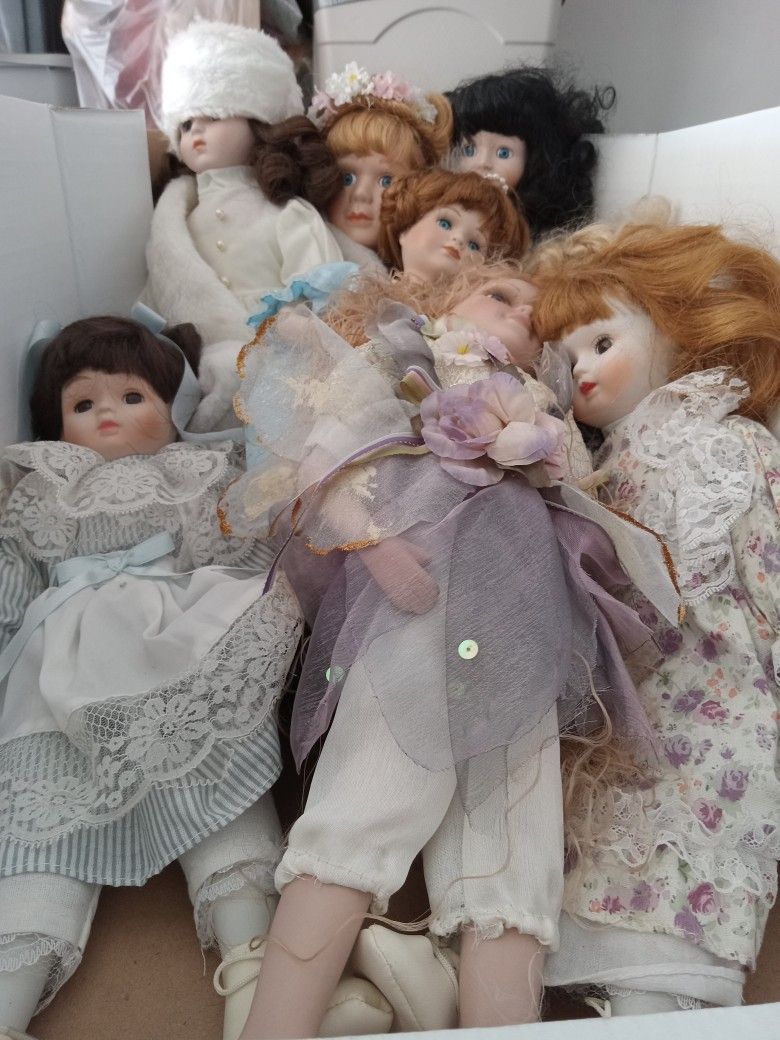 8 Porcelain Dolls 