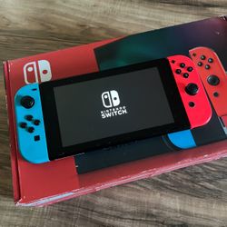 Nintendo Switch With Neon Blue And Neon Red Joycon 