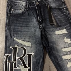 Size 31 Dark Blue Skinny Jeans With Leather Logo