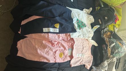 Girls 2t shirts and 3t pants.