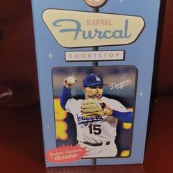 2007 Los Angeles Dodgers Rafael Furcal #15 bobblehead. 
It was a stadium exclusive giveaway item from the 2007 season. 
It features Rafael Furcal, who