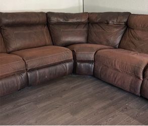 Large brown sectional couch recliner