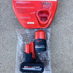 Milwaukee M12 New High Output Batteries 5.0 and 2.5 With Charger ( 100$ Firm )