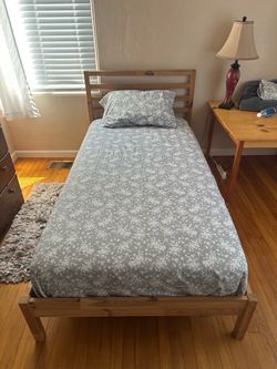 Twin bed frame, mattress  & bedding