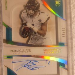 IMMACULATE SHADOW BOX SIGNATURES " TRAVIS ETIENNE JR.