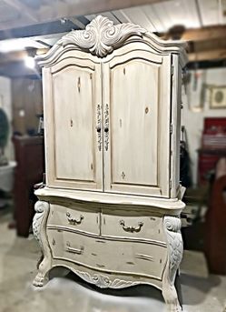 Vintage claw foot armoire