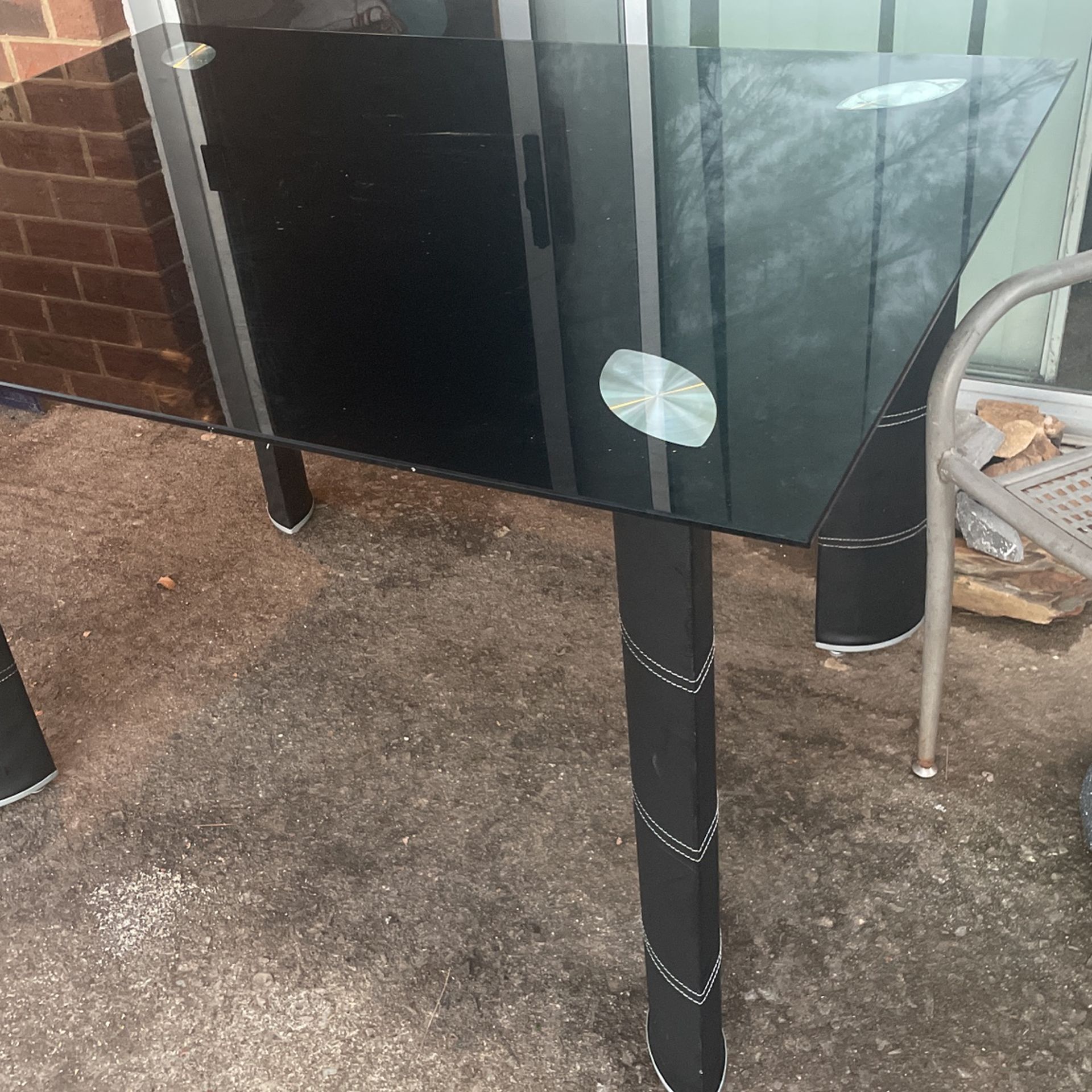Black glass & faux leather dinette table