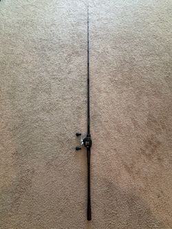 Bates goat with reel and rod