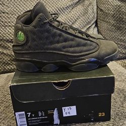 Size 7Y Black Cat 13s