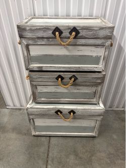 Crest view Collection Nantucket Weathered Wood Trunks, a set of three.