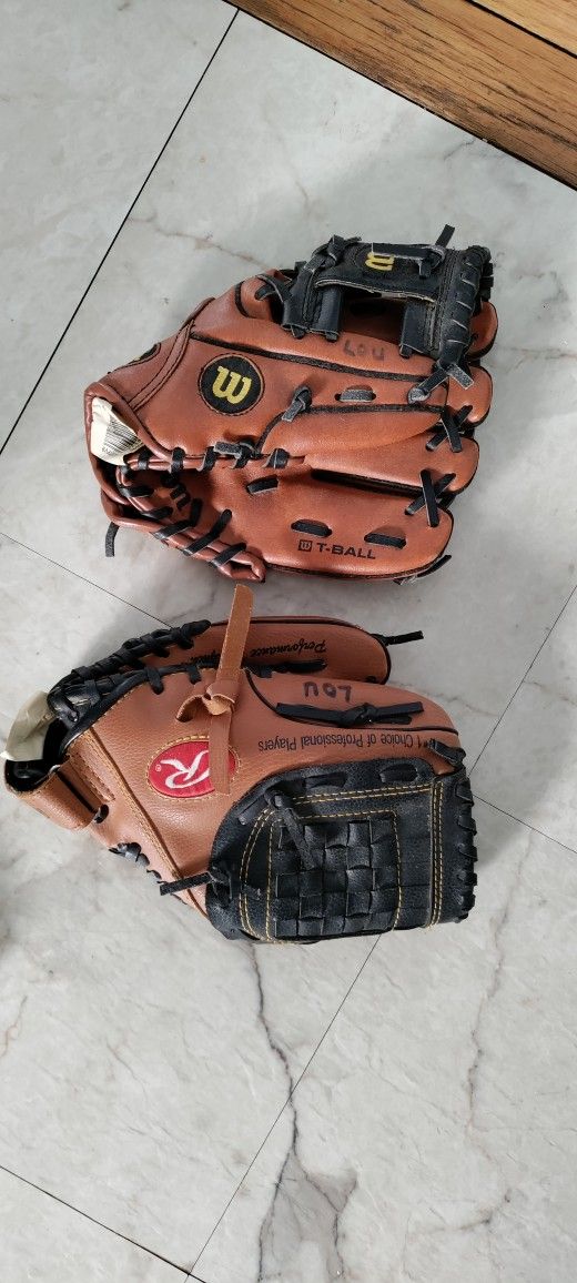 Two T-Ball Gloves , Used