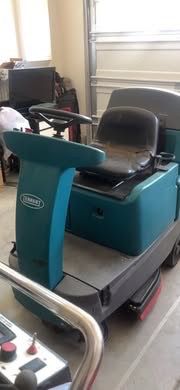 Tenant T7 Ride on floor scrubber