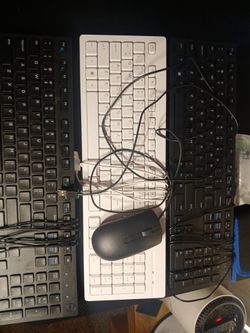 2 wired keyboards 2 in black and 1 white and 1 wired black mouse 5$ FOR ALL IT