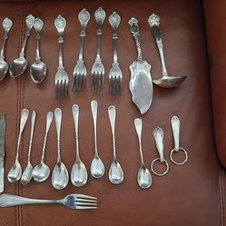 Collectables silver spoons and forks...