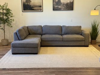 Gray Costco sectional couch delivery available