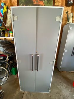 2 Sauder Brand cabinets with shelves
