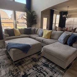 Sectional sofa with oversized ottoman