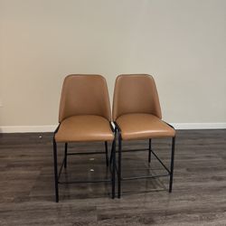 Two Leather Stools W/ Backs