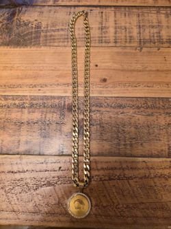 Men's Stainless steel chain and Religious medal.
