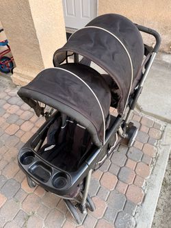 Double stroller with kid chair/stand