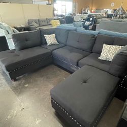 Black Reversible Sectional with Ottoman 