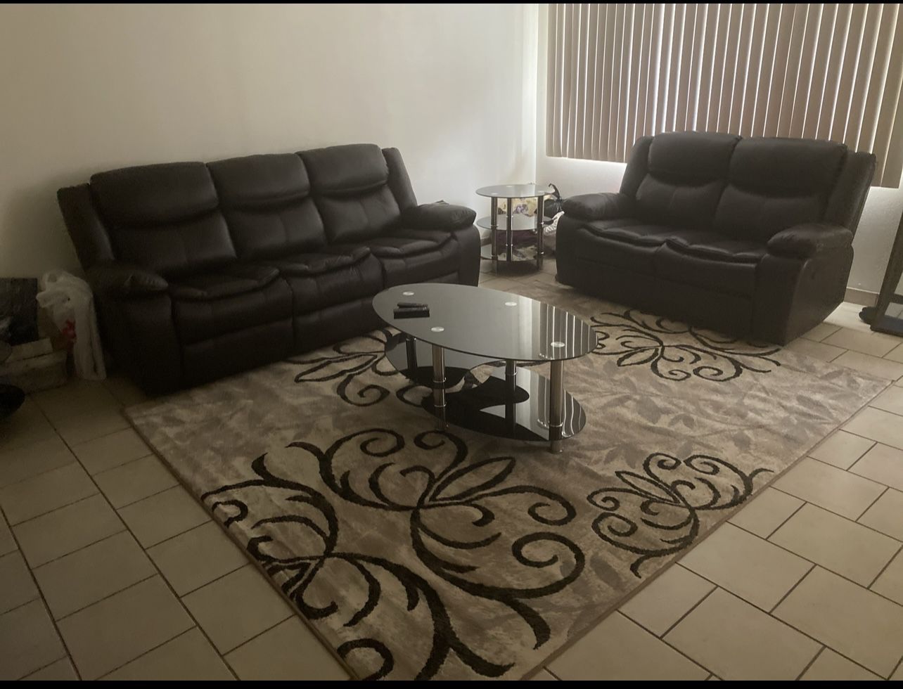 Dark Brown reclining couches/sofa