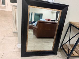 Black framed mirror