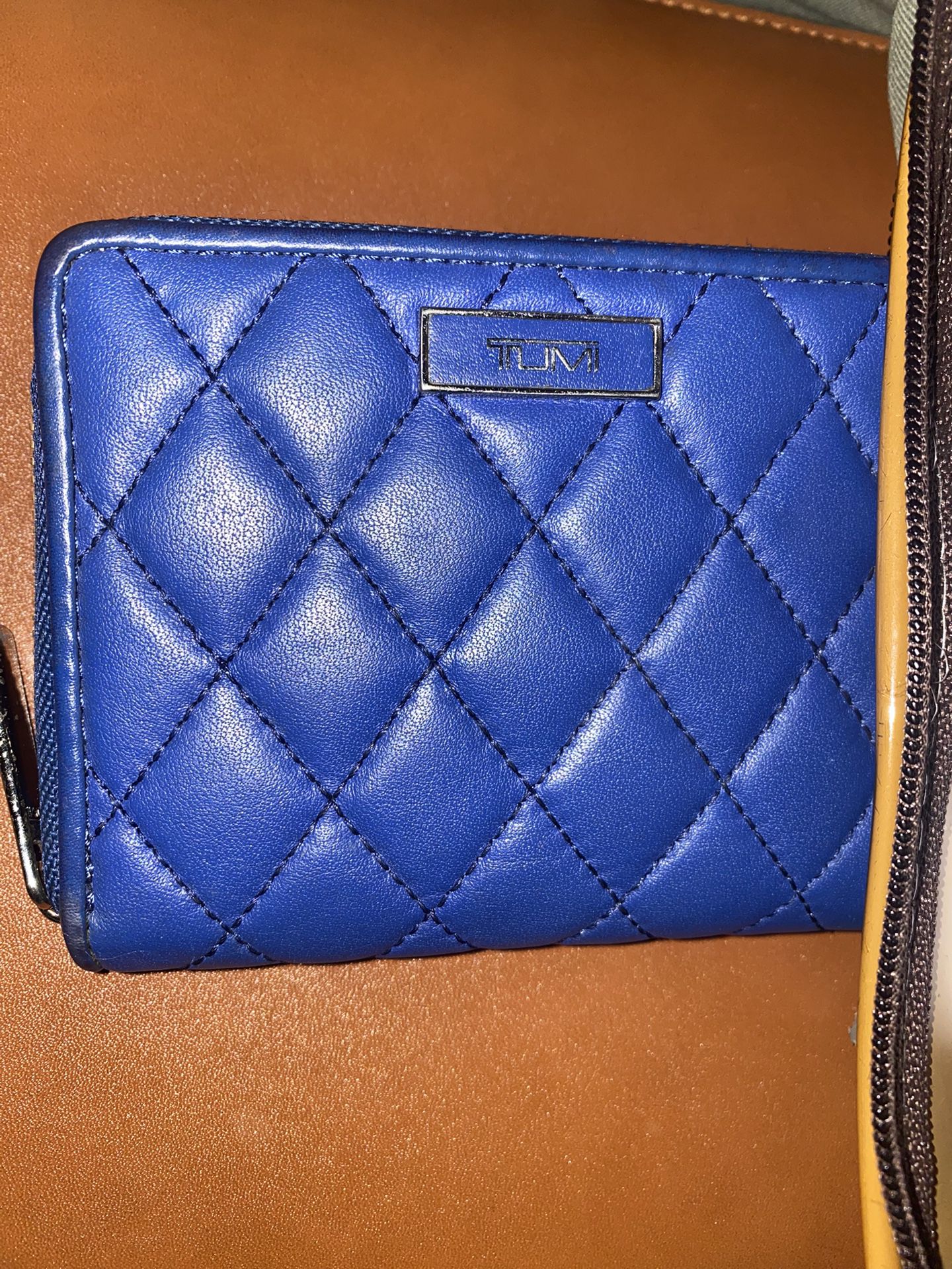TUMI Woman’s Diamond Quilted Wallet In Blue