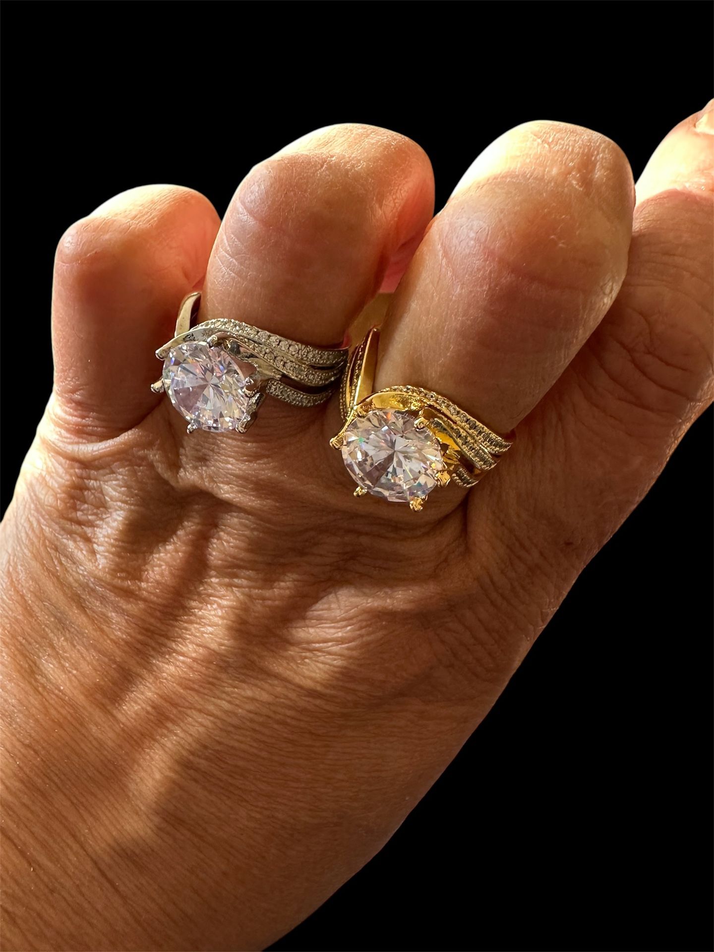gold plated. tarnish free. zircon. free size ring silver and gold$20 each 2 for $35