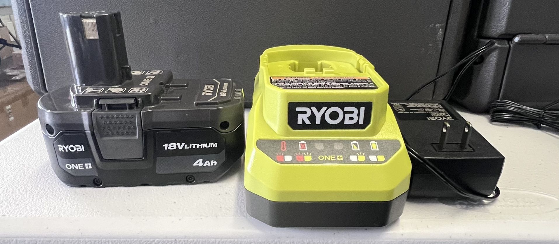 New BATTERY AND CHARGER- RYOBI 18V 4AH BATTERY AND CHARGER