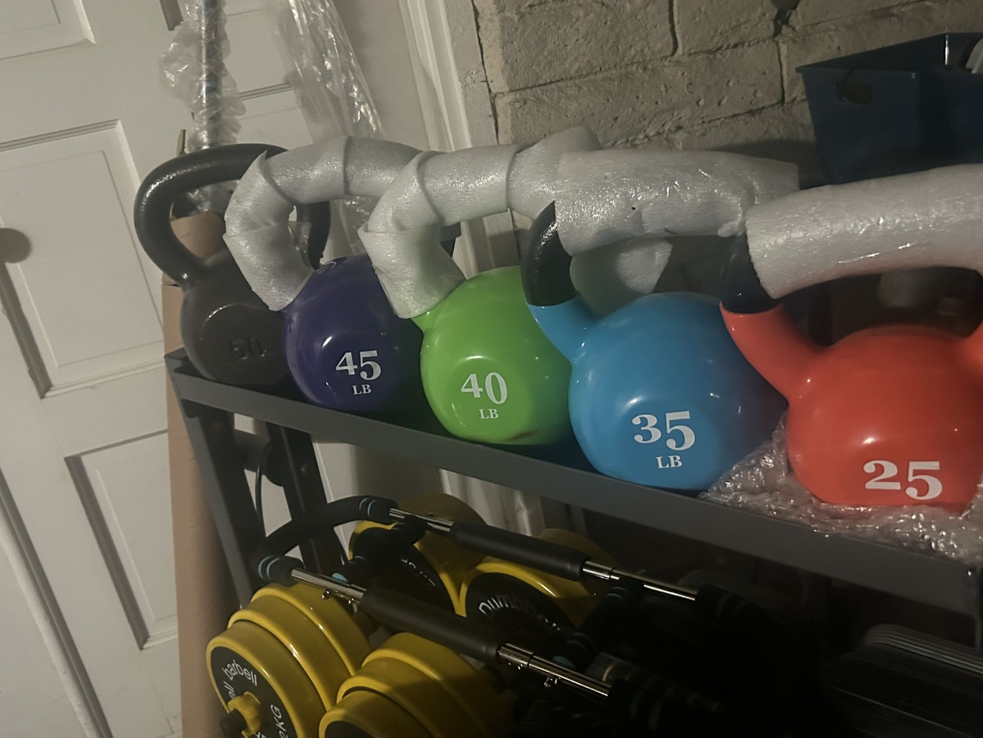 New kettle bells, a dollar a pound