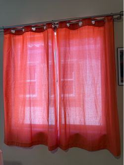 2 pink curtains